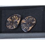 A pair of ammonite earrings
