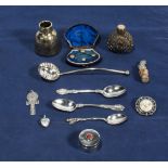 A small box of collectable items, including collar studs and silver plated items