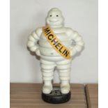 A large cast Michelin man