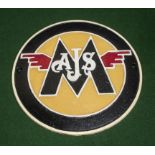 A cast AJS Matchless wall plaque