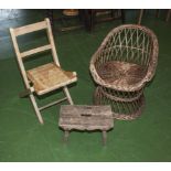 A basket chair, folding chair and a small stool
