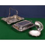 A silver plated tureen, fruit basket and a scallop dish