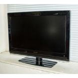A 30" Philips flat screen television