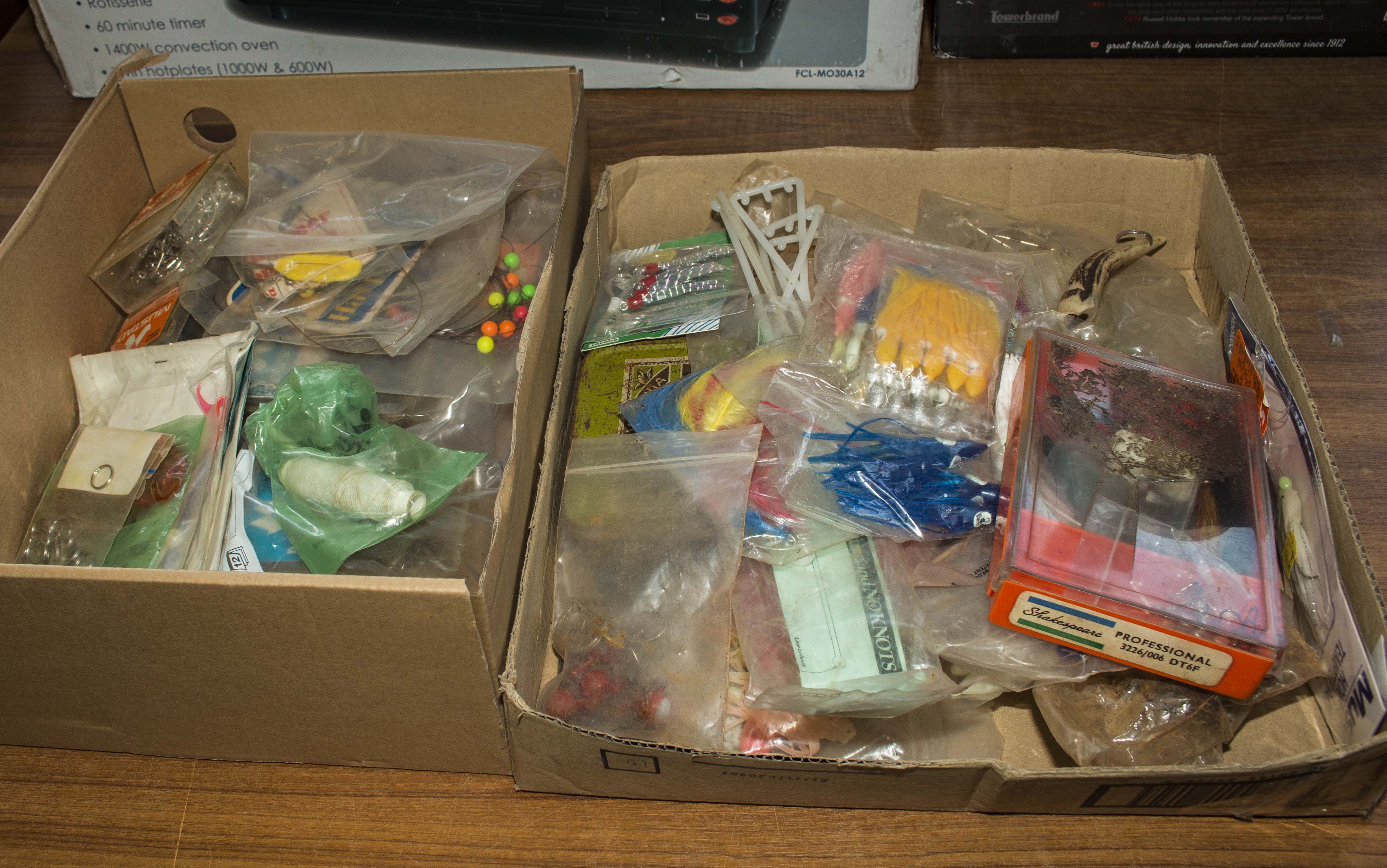Two boxes of fishing flies and lures