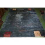 A large blue ground wool carpet with tree design, originally from Harrods of London, size 3.5m x 2.