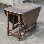 An oak gateleg table