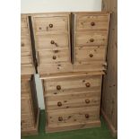 A pine chest of three drawers together with two bedside drawers