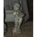 A reconstituted stone cherub