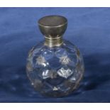 A silver topped perfume bottle, marks for Birmingham 1906