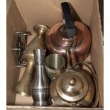 A box containing brass and copper ware