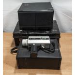 A cine camera, cash box and a storage box