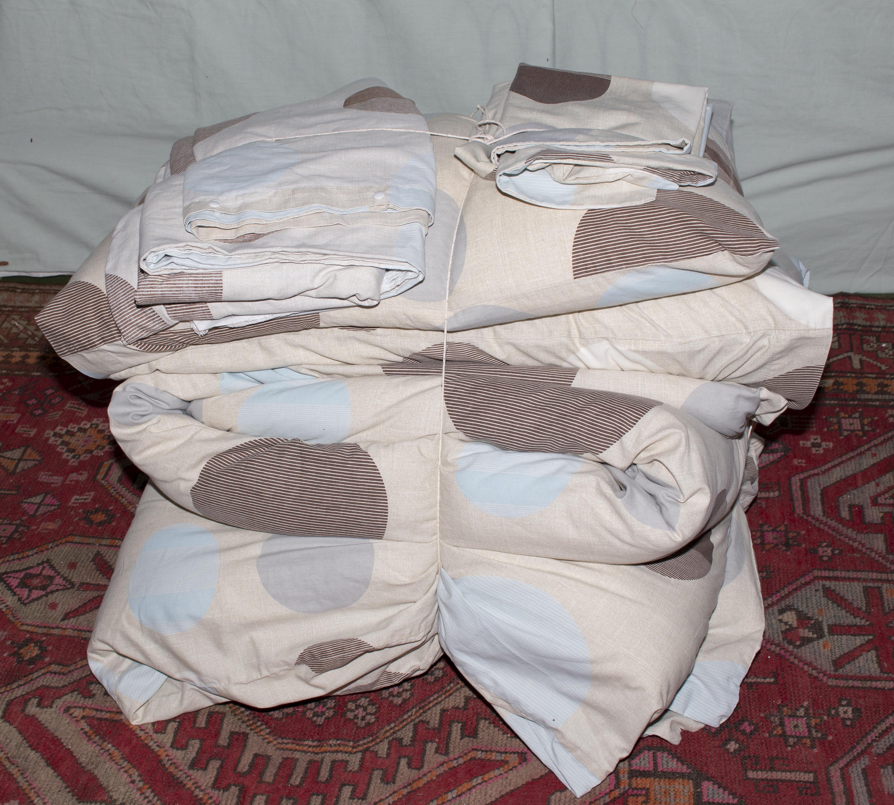 A bedding bale containing double duvet and bed linen