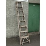 A pair of vintage step ladders