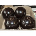 Four bowling bowls