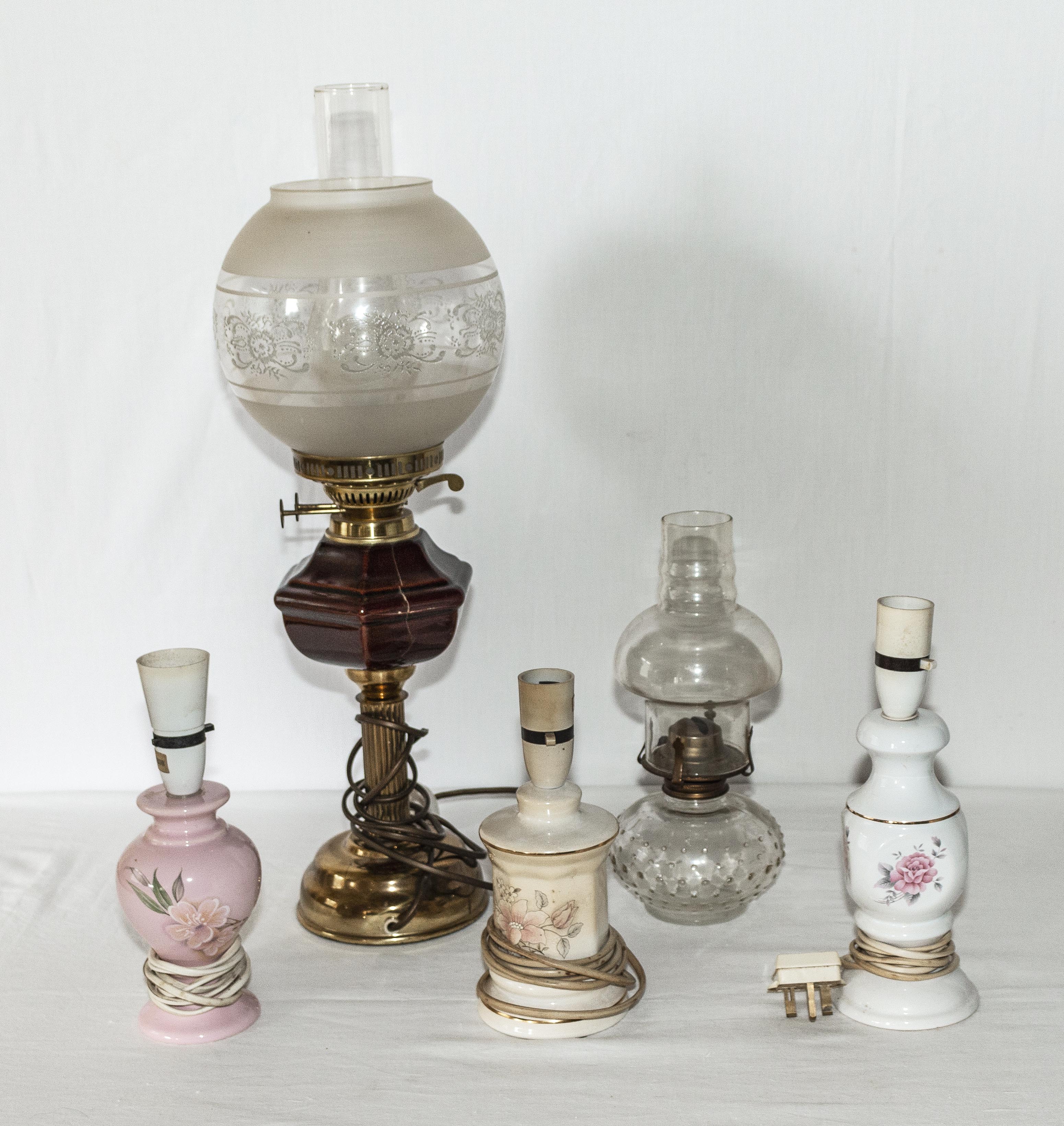 Three table lamps and two oil lamps