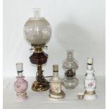 Three table lamps and two oil lamps