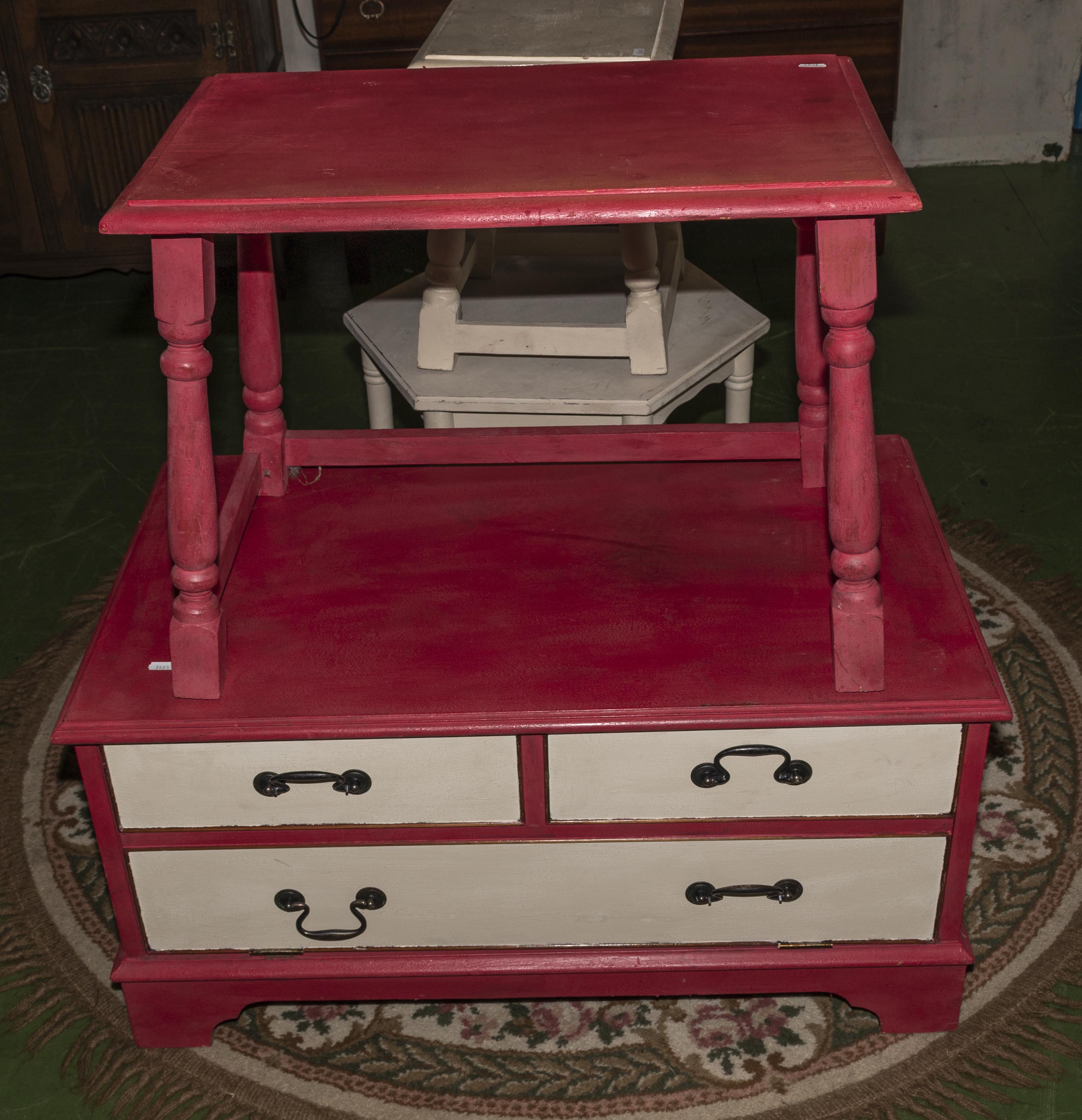 A painted media unit and a side table