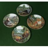 Four Davenport decorative plates