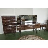 A retro lacquered four piece bedroom suite