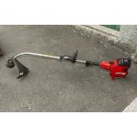 A Jonsered petrol strimmer