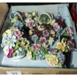 A box containing ceramic flower