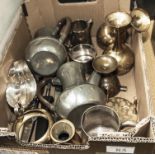 A box containing metalware