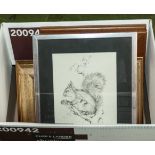 A box containing framed prints