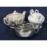 Two teapots and a sugar bowl