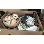 A box of pottery items