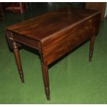 A mahogany Pembroke table.