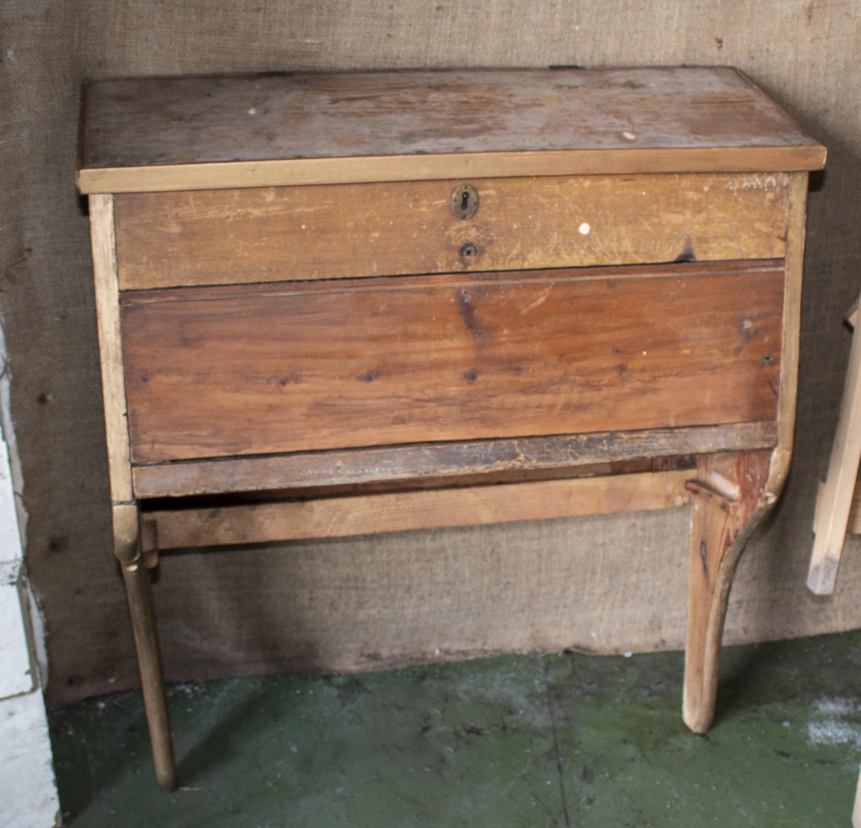 A vintage wooden grain/flour bin
