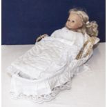 A doll and carry cot