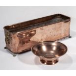 A copper planter and a bowl