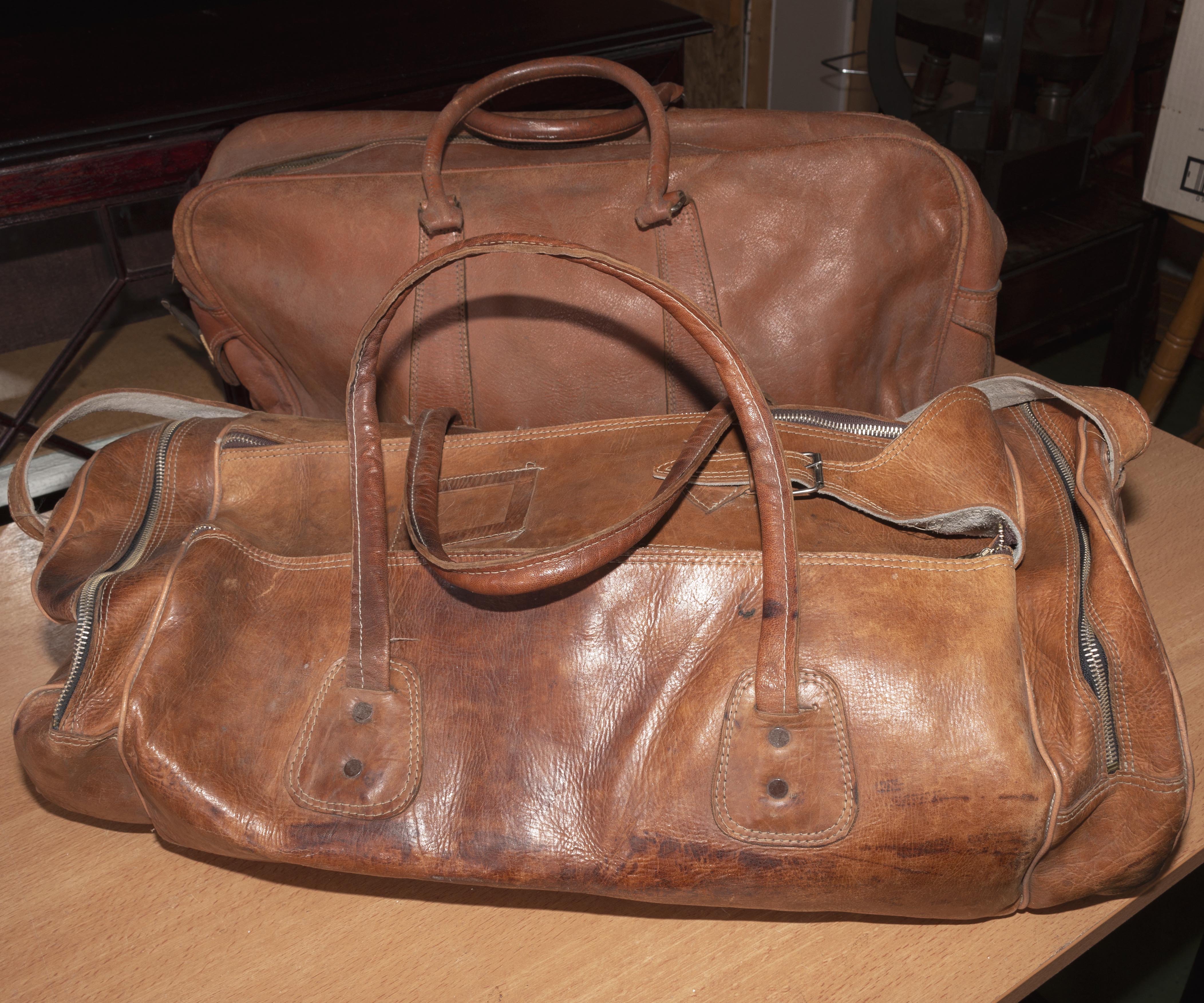 Two vintage leather holdalls