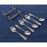 Six silver coffee spoons and two plated knife rests