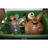 A box containing assorted glass and stone ware bottles