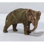 A small Japanese ceramic elephant 10cm tall 14cm long