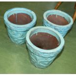 Three terracotta plant pots