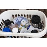 A box containing assorted cups and mugs