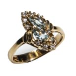 Lady's 18ct gold ring set with diamonds and aquamarine