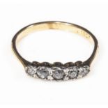 An 18ct gold 5 stone diamond ring, 40 point, size R