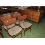 A retro dining suite 4 chairs table and sideboard