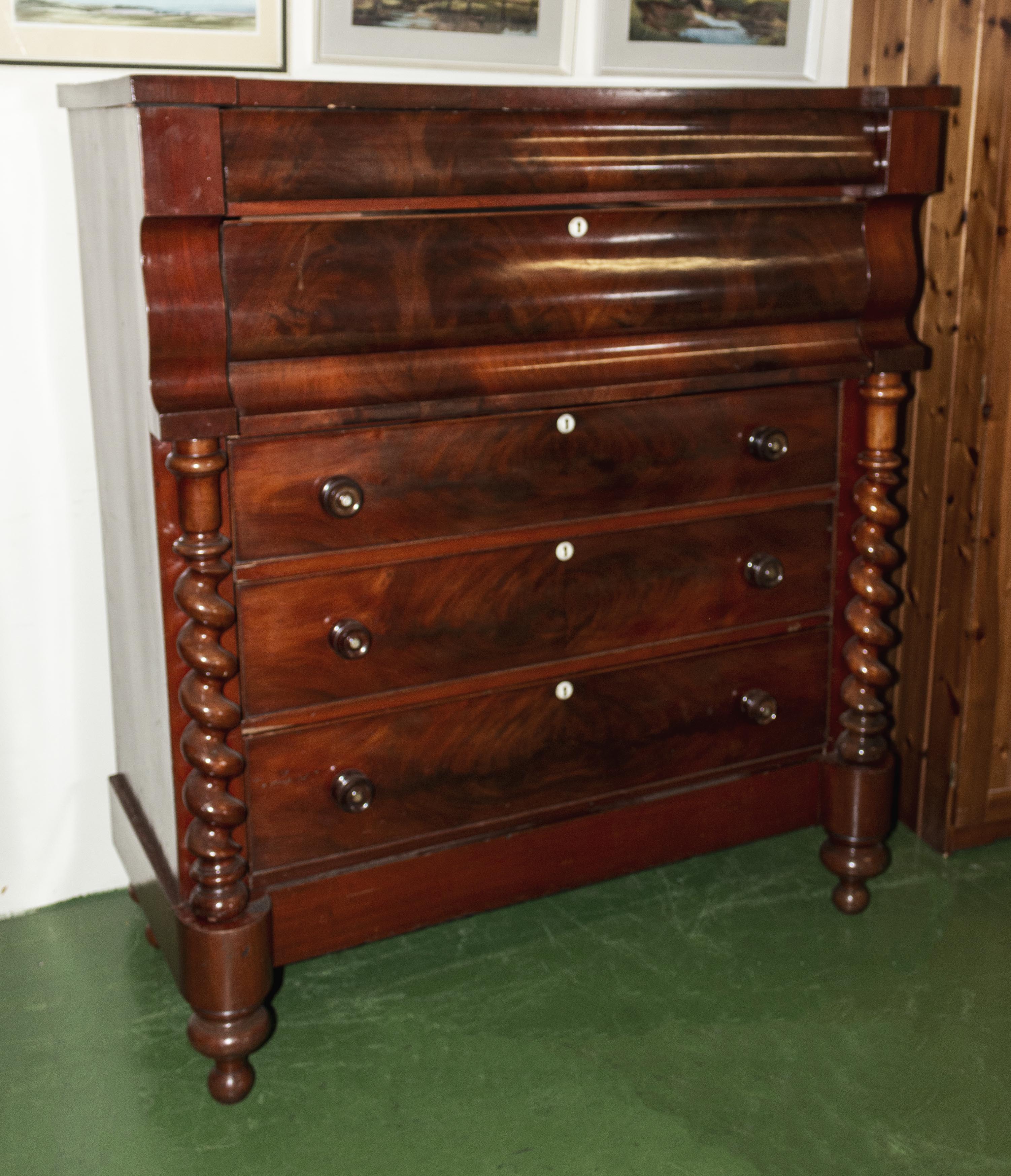 A Victorian mahogany Scotch chest .