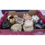 A box of assorted pottery teapots