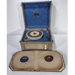 A vintage Dansette record player and records