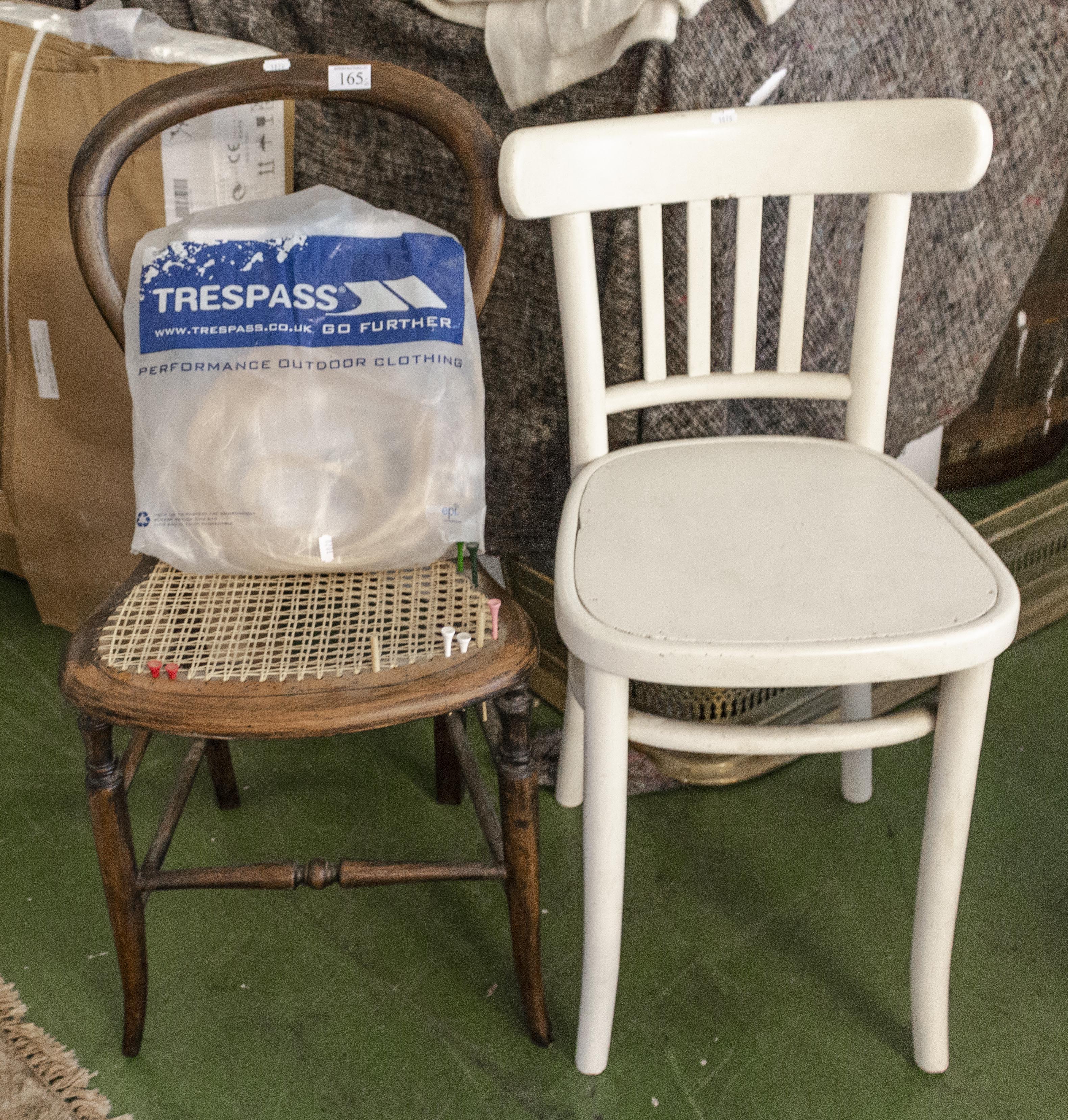 A bentwood kitchen chair and a bergere chair in need of restoration