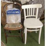 A bentwood kitchen chair and a bergere chair in need of restoration