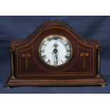 An Edwardian inlaid mahogany mantle clock