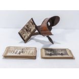 An antique stereoscope and a number of stereographs