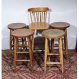 Four pine bar stools and a bar chair